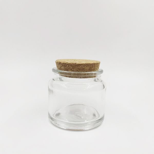 100ml transparent brown scented tea candle in a can with wooden stopper and holder