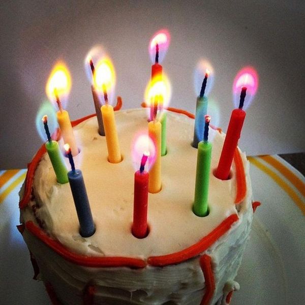 12-piece multicolor flame candles for weddings, birthdays, and home decor