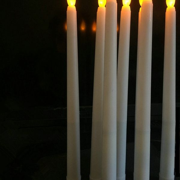 30 amber LED flickering flameless ivory taper candle lamps, 11" battery-operated for wedding and home decor, 28cm height, model T200108