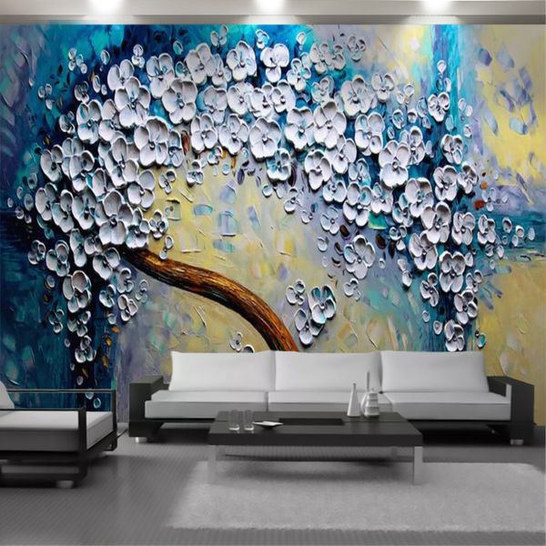 3D textured wallpaper featuring embossed white floral and tree designs, creating a scenic backdrop for living rooms and bedrooms