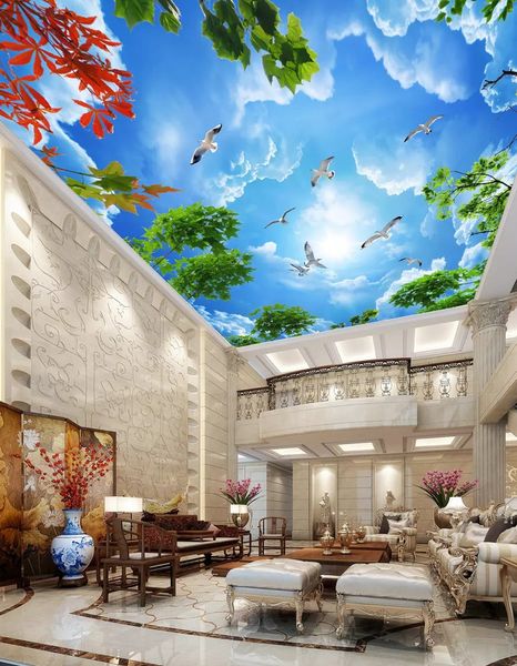3D wall murals featuring a stunning blue sky with white clouds and branches for living room ceilings