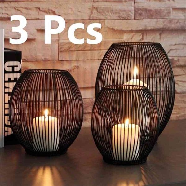 3-piece iron candle holder set featuring vintage-style hollow lanterns for tabletop decor, wedding use, and home lighting (candles not included)