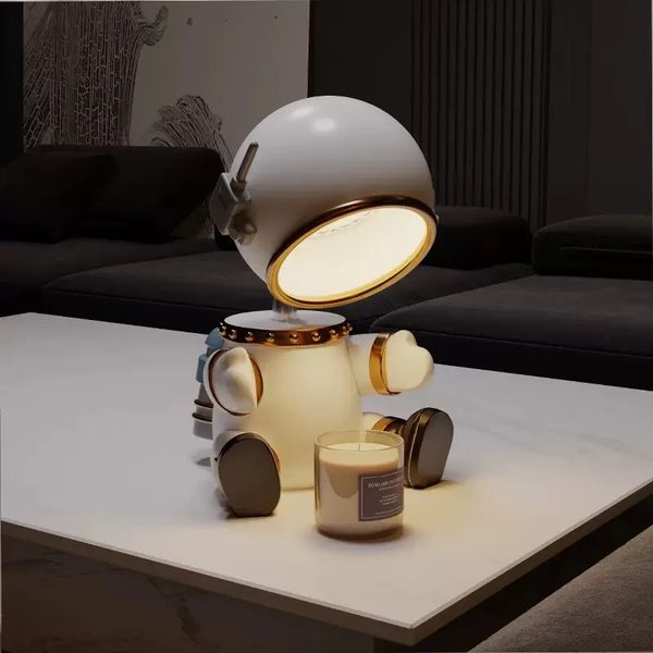 Adjustable angle desk lamp with candle warming function, featuring a robot astronaut design for home fragrance and decor