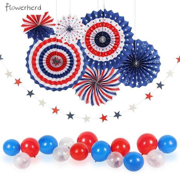 American Independence Day party decorations featuring patriotic red, blue, and white paper fans, star garlands, and spiral string designs