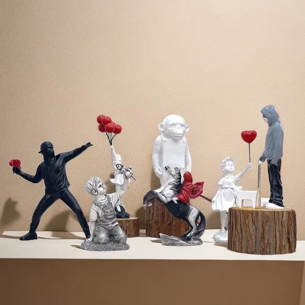 Banksy-inspired Flower Thrower sculpture, a stylish pop art figurine for modern decor