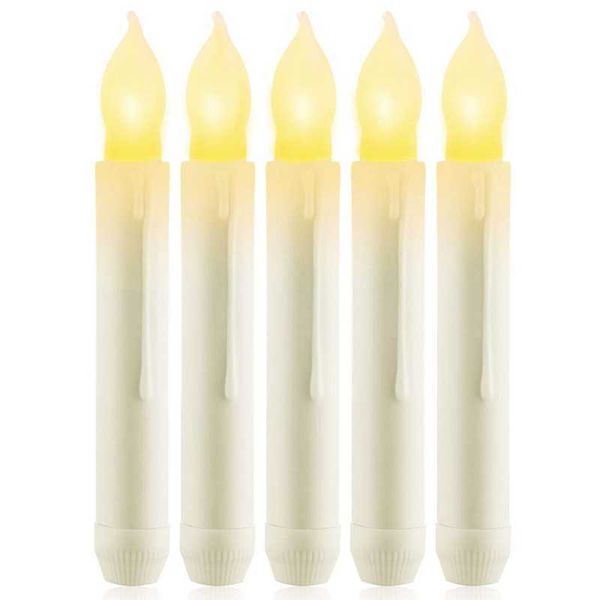 Battery-operated fake taper candles with a flickering effect for window decoration