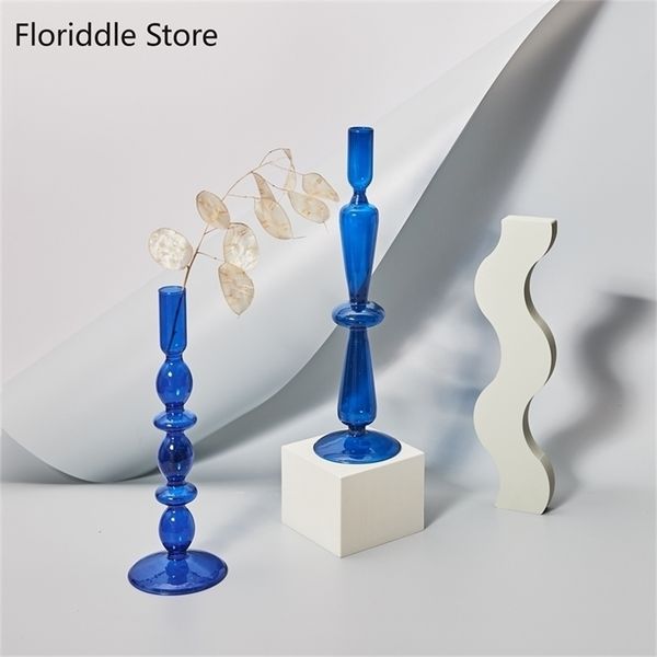 Blue glass candle holders for elegant wedding, birthday, and home decoration