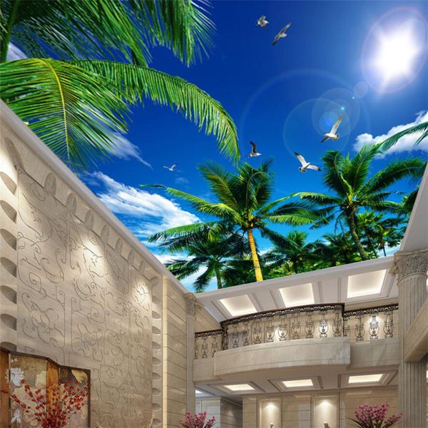 Blue sky with white clouds, seagulls flying under a ceiling mural, featuring custom large green wallpaper designs