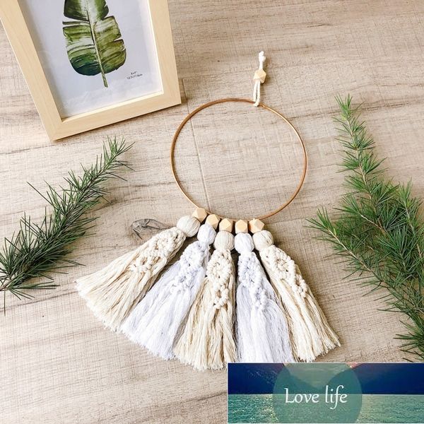 Bohemian-style wooden bead garland with tassels for home decor, featuring a circular ring design and crafted with quality materials