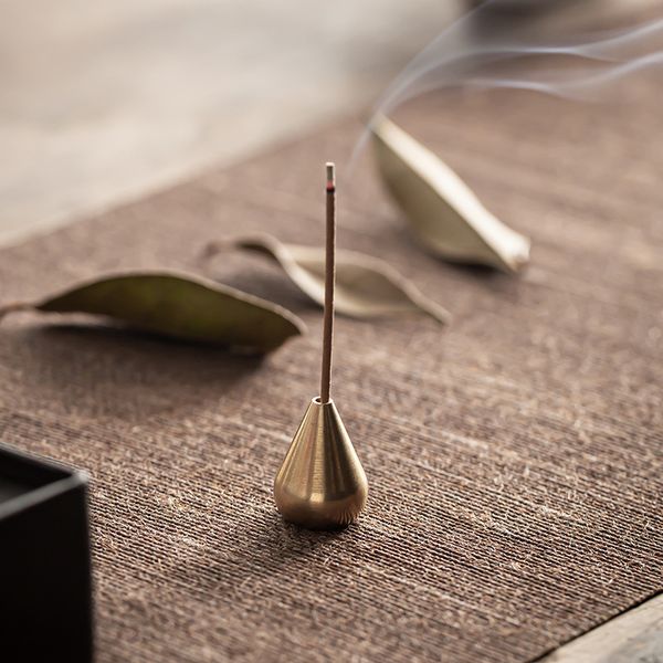 Brass mini incense holder in a water drop shape, perfect for home decor