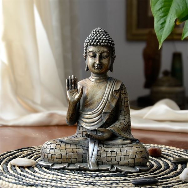 Buddha statues from Thailand, elegant sculptures for home or office decor, vintage-style desk ornaments, and thoughtful gift figurines inspired by Hindu traditions