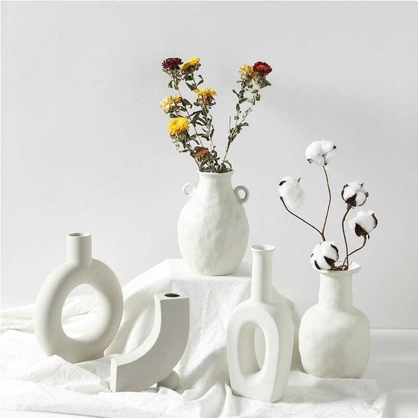 Ceramic Nordic-style white flower vases for home decor, centerpieces, and wedding crafts