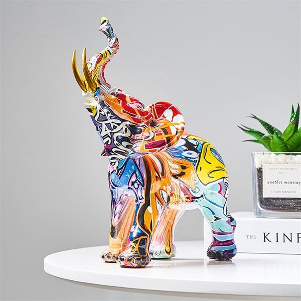 Colorful graffiti-style elephant sculpture, a creative resin art piece for home or porch decor