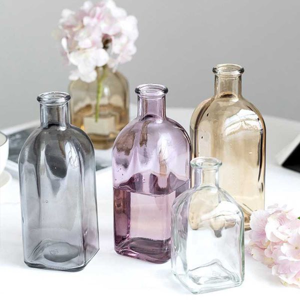 Colorful transparent glass vases for home decor and floral arrangements