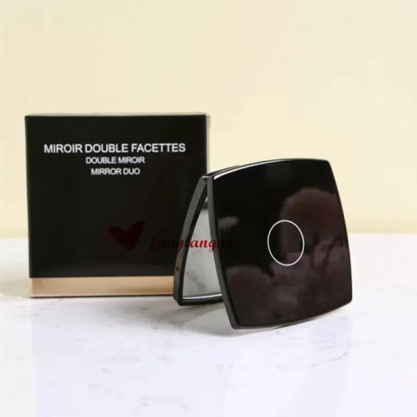 Compact folding mirrors for women, stylish black travel makeup mirrors with smooth double-sided design, ideal for on-the-go beauty touch-ups