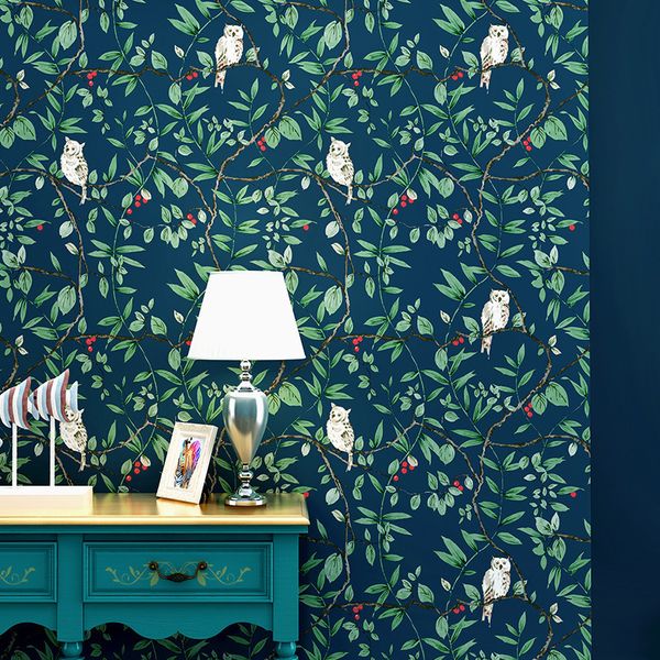 Country garden-themed vintage wallpaper featuring birds, flowers, and green leaf patterns with owl designs for bedroom or living room TV walls