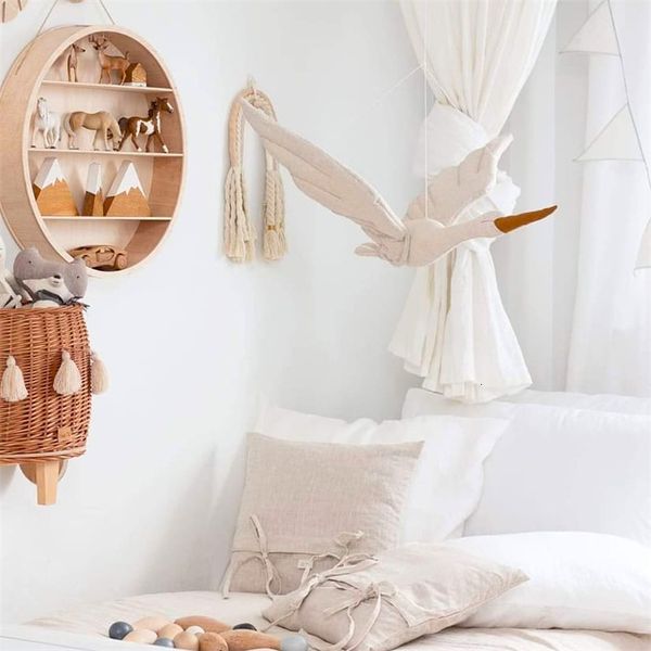 Creative wall decor featuring a plush swan doll, perfect for family bedrooms, nurseries, or as a soothing baby pillow