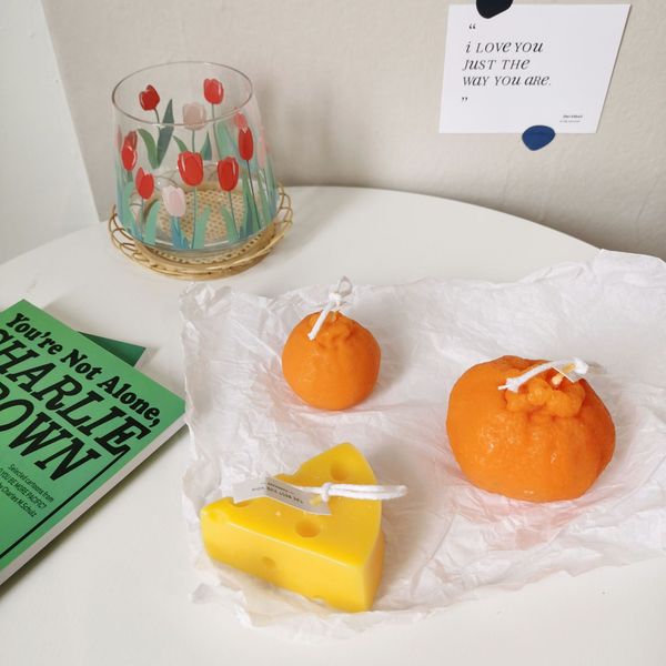 Cube-shaped soy wax bubble candles in orange, lemon, and cheese scents for aromatherapy and relaxation, perfect as small birthday gifts