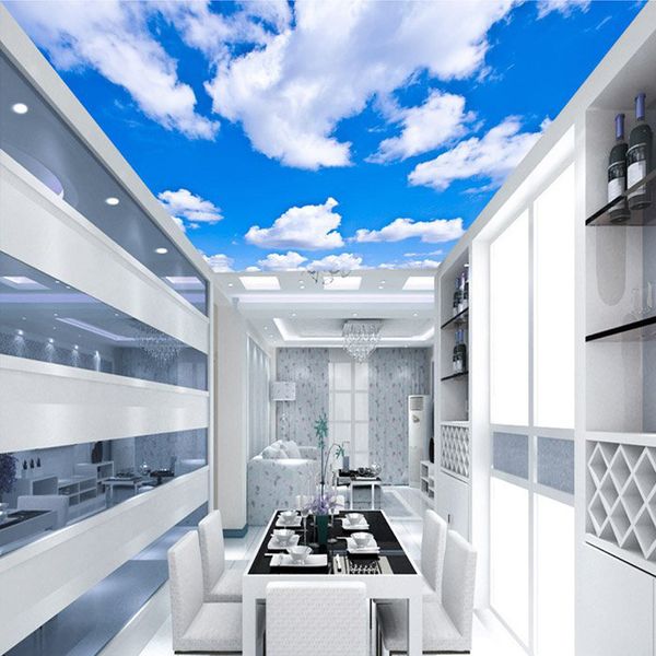 Custom ceiling wallpaper featuring a blue sky with white clouds mural design