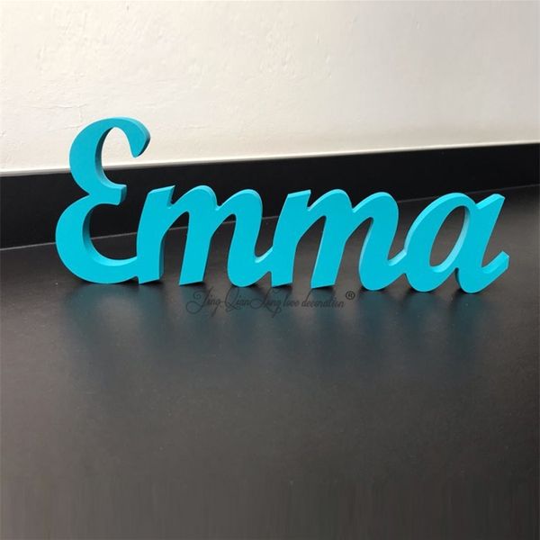 Custom wooden name signs for kids' wall decor featuring wooden letters and names