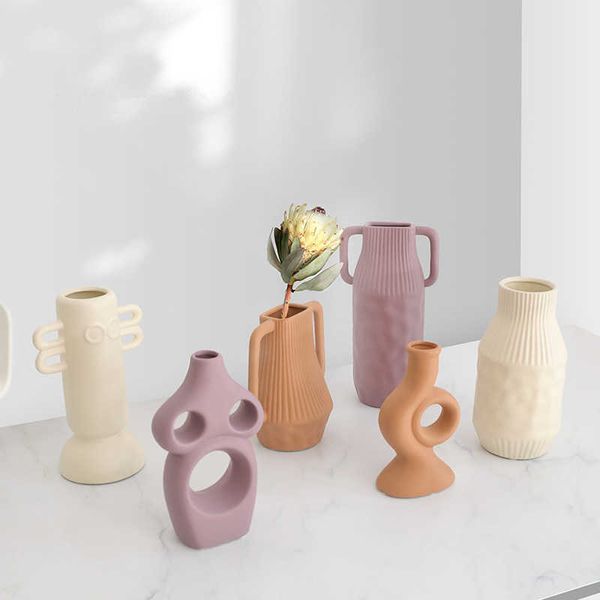 Cutelife Ceramic Geometric White Modern Vase Nordic Decoration Home Flower Table Vase Retro Living Room Small Plant Wedding Vase 210623

Modern white geometric ceramic vase for Nordic home decor, f...