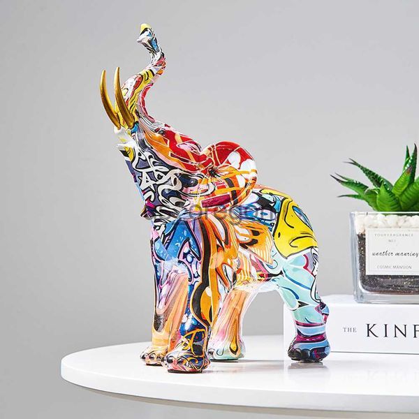 Decorative elephant figurine with vibrant graffiti-style painting, crafted from creative resin for home or porch decor