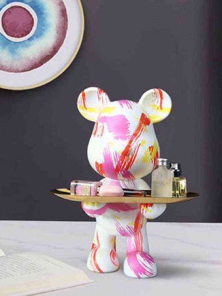 Decorative resin bear figurine with graffiti design, copper tray, and key storage for porch home decor
