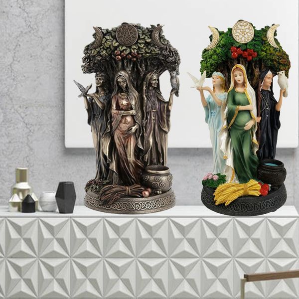 Decorative resin statue of the Celtic Triple Goddess, representing the Maiden, Mother, and Crone