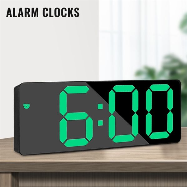 Digital alarm clock with mirror LED display, snooze function, and night light for home decor