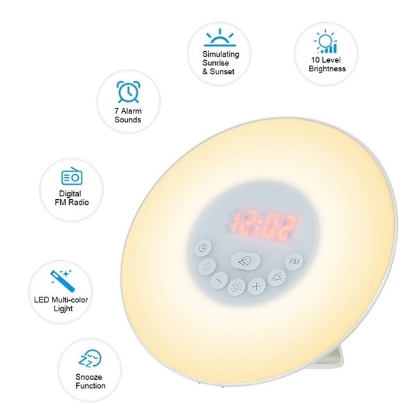 Digital alarm clock with sunrise simulation, FM radio, and snooze function