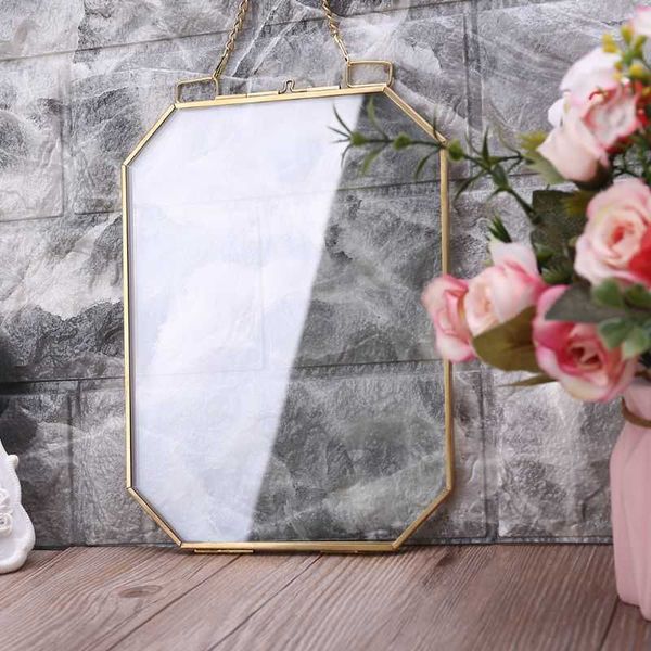 Double-sided metal and glass floating frame for displaying portraits, plants, or specimens in home decor