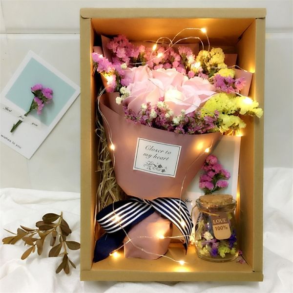 Dry flower arrangements featuring real blooms, star-shaped bouquets with lights, forget-me-not roses, and soap flower gifts in decorative boxes for Christmas