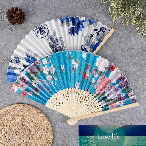 Elegant silk folding fans in Chinese and Japanese styles, perfect for weddings, dances, or as artistic gifts, featuring vintage bamboo designs and hand-held floral patterns at factory prices
