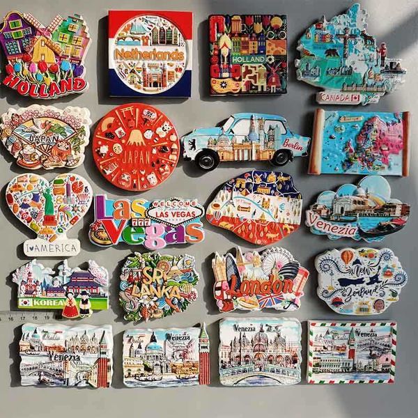 European refrigerator magnets featuring Venice, Netherlands, Berlin, and other travel souvenirs from Dominica, Canada, Dutch, and Japanese designs for fridge decoration