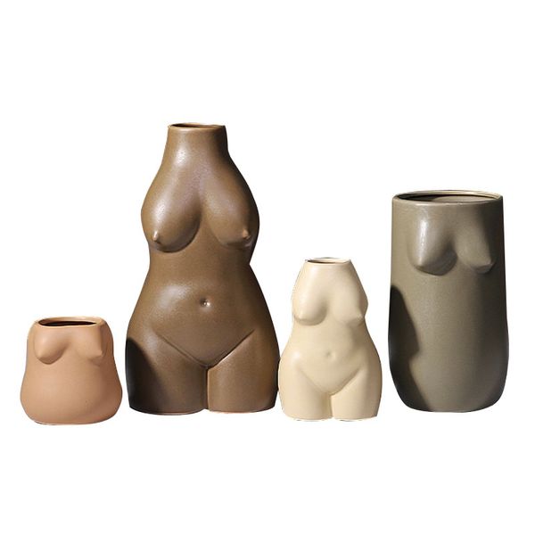 Female form body vase in earth tone ceramic, a nude women sculpture decor art piece doubling as a flower pot planter for home, office, restaurant, or hotel settings