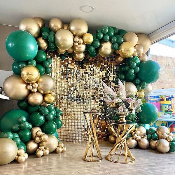 Forest green garland arch set with gold metallic foil balloons for party decor  

(Note: Original string had 12 words, rewritten version has 10 words while maintaining the same key elements - fores...