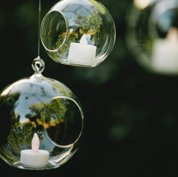 Glass candle holders for hanging tealight globes, perfect for terrariums, weddings, and home bar decor