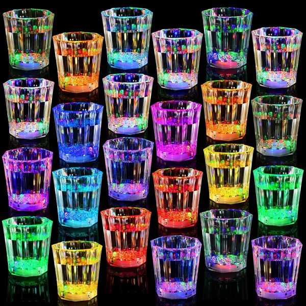 Glow-in-the-dark LED party cups and clear acrylic centerpieces for nightclub events and birthday celebrations