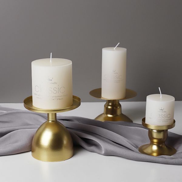 Gold wedding candle holders with metal legs for table centerpieces and home decor