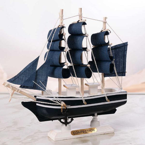 Handcrafted Mediterranean-style wooden sailing ship model, a nautical-themed home decor piece and unique gift option