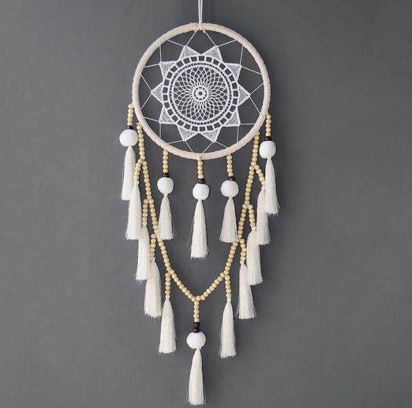 Handmade dreamcatcher wind chimes for home decor, crafted as a unique gift or car ornament