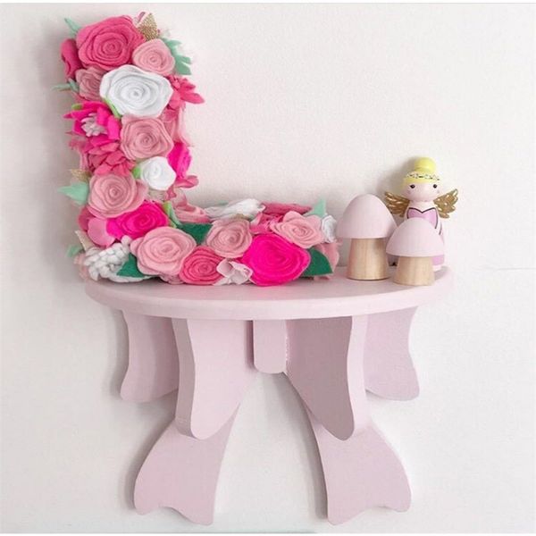 INS Nordic-style decorative wall shelf with macaron bow and wooden frame, perfect for kids' room decor