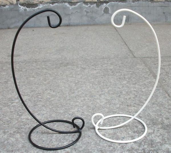 Iron spiral stand for hanging plants, ornaments, or candles in home or wedding decor
