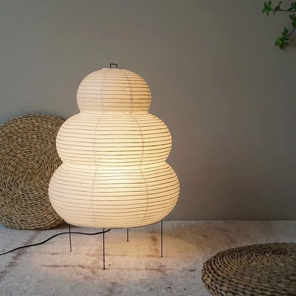 Japanese Wabi-Sabi style tripod floor lamp for bedroom, living, or study, featuring a white rice paper shade