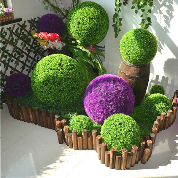 Large green artificial topiary ball for weddings, parties, and home or outdoor decoration