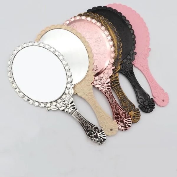 Makeup Mirrors Ladies Vintage Repousse Oval Floral Hand Held Dresser Romantic Lace Hand-held Mirror Bronze Silver Gold Pink Cosmetic LL

Vintage floral hand-held makeup mirrors for ladies in oval repousse designs with romantic lace, available in bronze, silver, gold, and pink