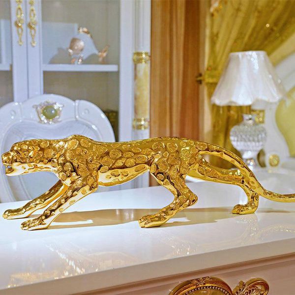 Modern geometric gold panther figurine, a stylish resin leopard statue for wildlife decor, car gift, or craft ornament