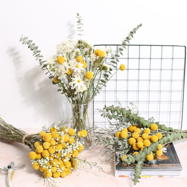 Natural dried gypsophila and eucalyptus with golden balls for wedding and home decor