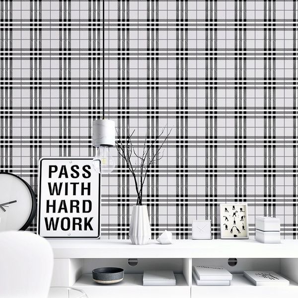 New Nordic-inspired geometric wallpaper roll featuring black and white designs, perfect for kids' rooms and modern living spaces