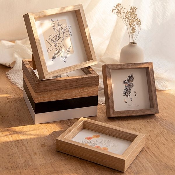 Nordic-inspired creative photo poster stand for wall or desktop display, also serves as a dry flower holder